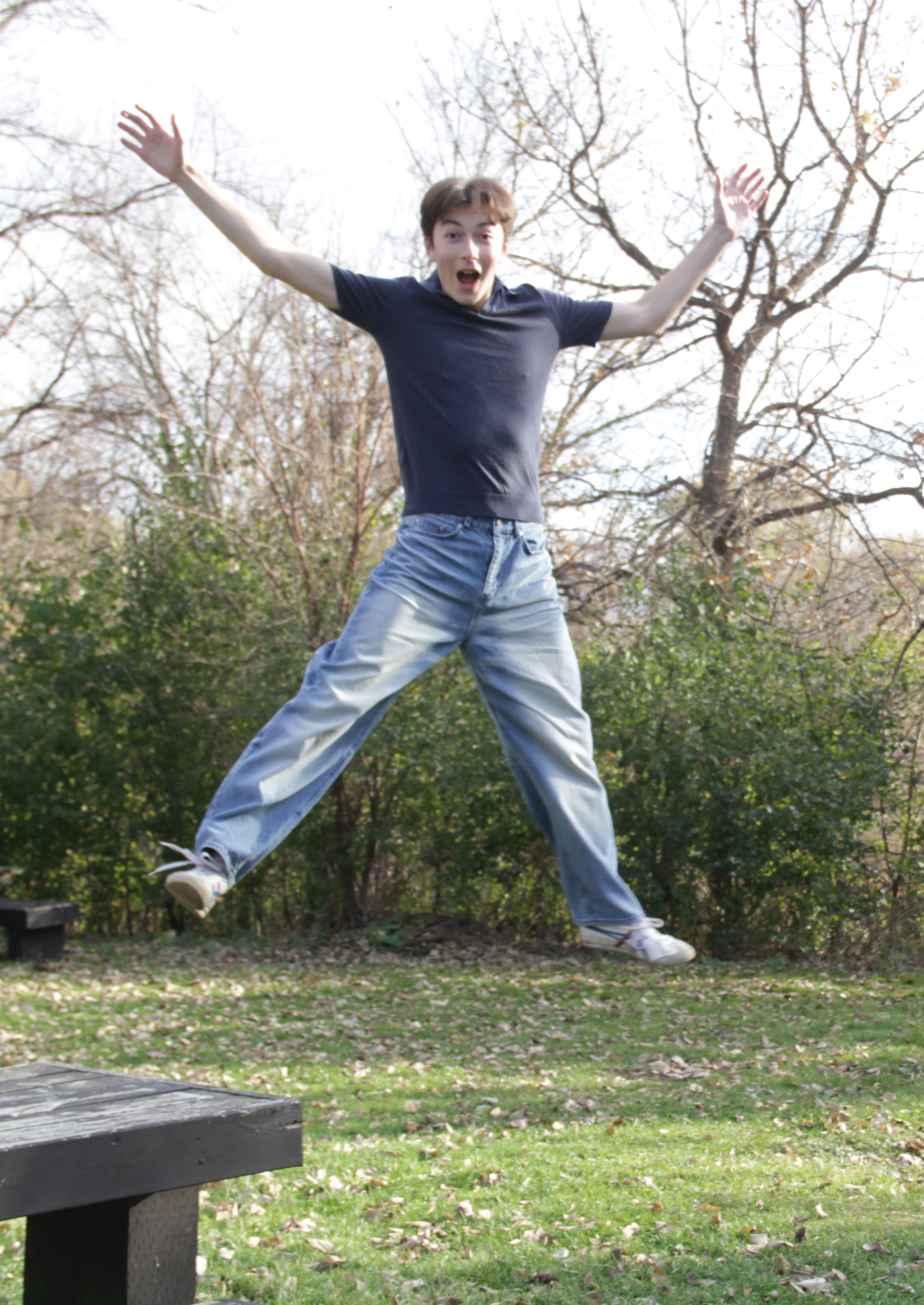 Theo, mid-jump in a park in Southwest Minneapolis